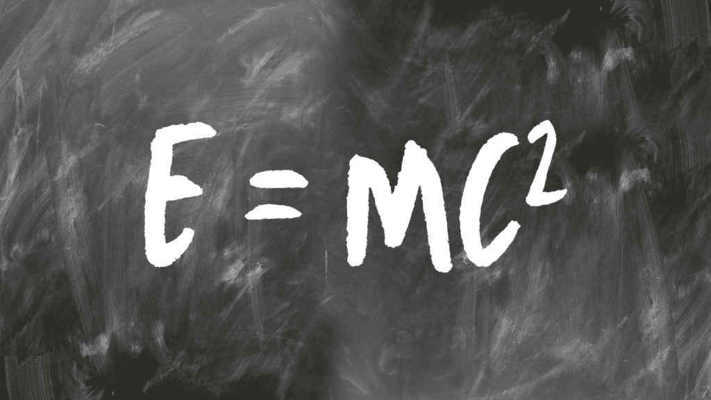 E=MC^2 is written on a blackboard